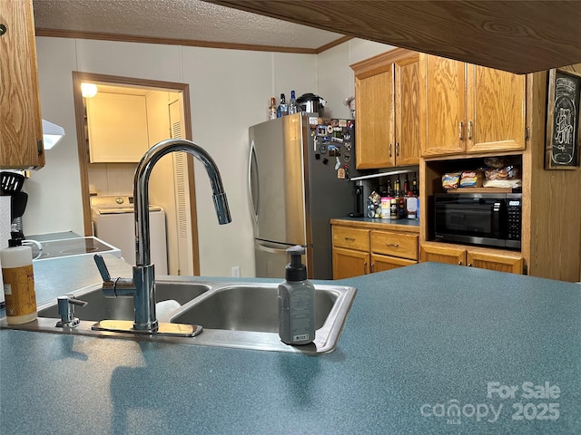 117 Haystack Ln, Olin, NC 28660 - kitchen with freestanding refrigerator, ornamental molding, extractor fan, and a textured ceiling