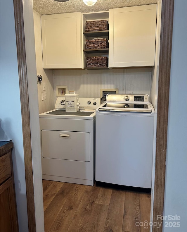 117 Haystack Ln, Olin, NC 28660 - laundry room with washing machine and clothes dryer, cabinet space, and dark wood-style flooring