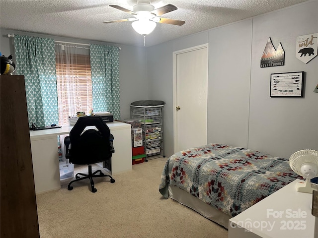 117 Haystack Ln, Olin, NC 28660 - carpeted bedroom featuring a desk, a textured ceiling, and ceiling fan