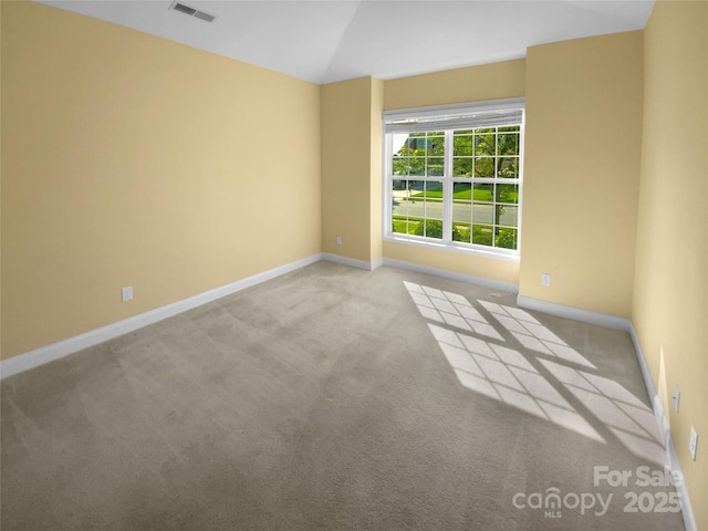 13419 Morgan Lee Ave, Charlotte, NC 28213 - carpeted spare room with baseboards and vaulted ceiling
