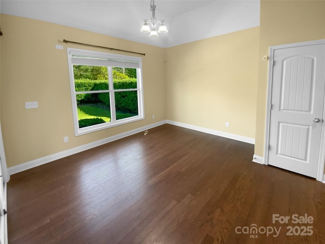 13419 Morgan Lee Ave, Charlotte, NC 28213 - unfurnished room with a chandelier, dark wood finished floors, and lofted ceiling
