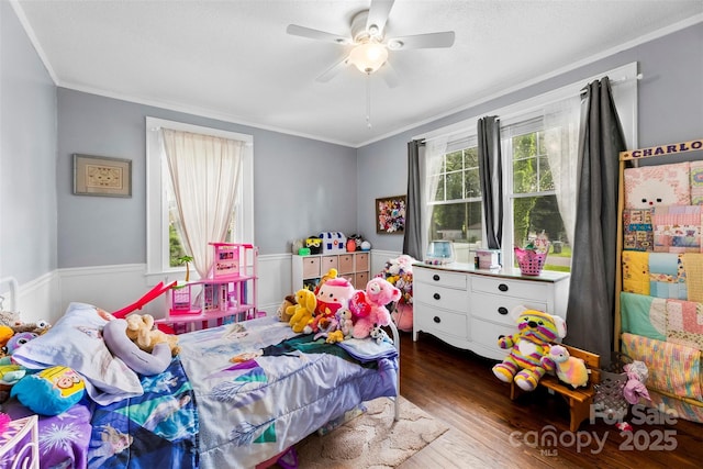 1210 Jackson Rd, Gastonia, NC 28052 - bedroom featuring crown molding, dark wood-type flooring, a wainscoted wall, and a ceiling fan