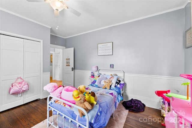 1210 Jackson Rd, Gastonia, NC 28052 - bedroom featuring wood finished floors, crown molding, wainscoting, ceiling fan, and a closet