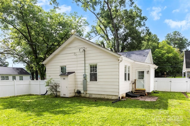1210 Jackson Rd, Gastonia, NC 28052 - rear view of house with entry steps, a fenced backyard, a gate, and roof with shingles
