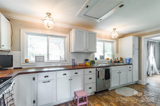 904 Venus St, Kannapolis, NC 28083 - kitchen with stainless steel appliances, tasteful backsplash, butcher block counters, and ornamental molding