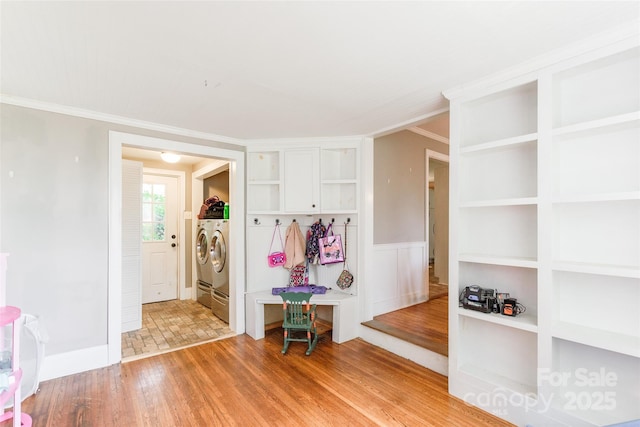 904 Venus St, Kannapolis, NC 28083 - mudroom featuring washer and dryer, light wood-type flooring, and ornamental molding