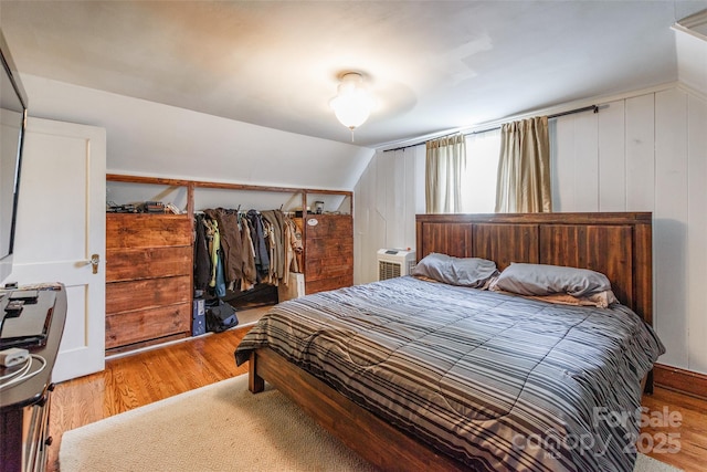 904 Venus St, Kannapolis, NC 28083 - bedroom featuring wood finished floors and vaulted ceiling