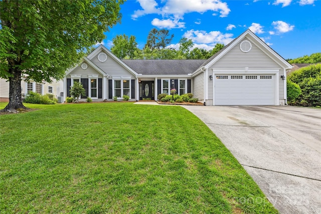 4313 Wynborough Ln, Charlotte, NC 28269 - ranch-style house featuring a garage, driveway, and a front lawn
