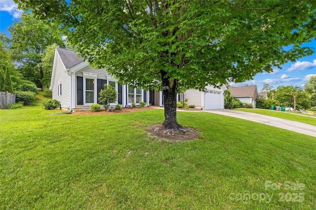 4313 Wynborough Ln, Charlotte, NC 28269 - view of property hidden behind natural elements featuring concrete driveway, a front lawn, and a garage