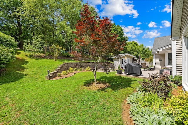 4313 Wynborough Ln, Charlotte, NC 28269 - view of grassy yard featuring a patio area and an outdoor structure