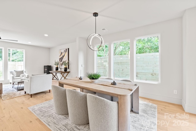 2733 Cowles Rd, Charlotte, NC 28208 - dining area with light wood-type flooring and recessed lighting