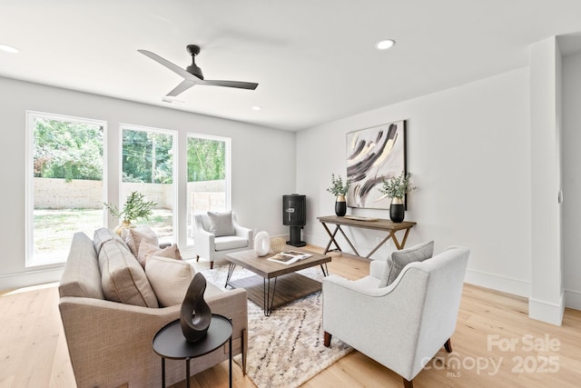 2733 Cowles Rd, Charlotte, NC 28208 - living room featuring plenty of natural light, ceiling fan, light wood-type flooring, and recessed lighting