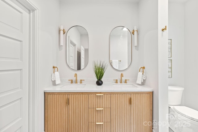 2733 Cowles Rd, Charlotte, NC 28208 - bathroom with double vanity and toilet