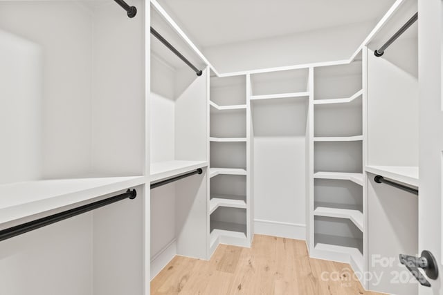 2733 Cowles Rd, Charlotte, NC 28208 - walk in closet with light wood-style flooring