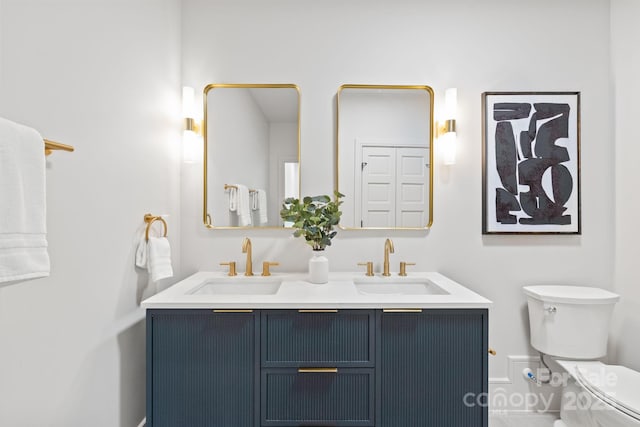 2733 Cowles Rd, Charlotte, NC 28208 - bathroom featuring double vanity and toilet