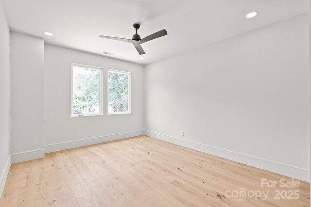 2733 Cowles Rd, Charlotte, NC 28208 - unfurnished room featuring wood finished floors, ceiling fan, and recessed lighting