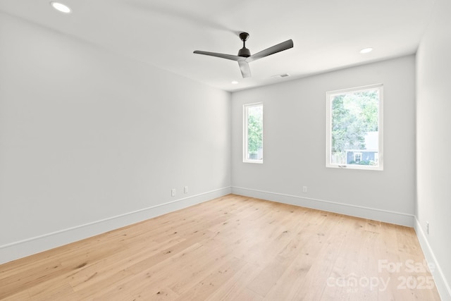 2733 Cowles Rd, Charlotte, NC 28208 - spare room featuring light wood finished floors, recessed lighting, and ceiling fan