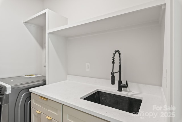 2733 Cowles Rd, Charlotte, NC 28208 - laundry area featuring a sink and washer / dryer