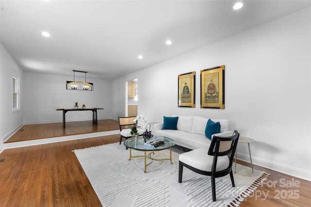 3701 Table Rock Rd, Charlotte, NC 28226 - living area featuring wood finished floors and recessed lighting