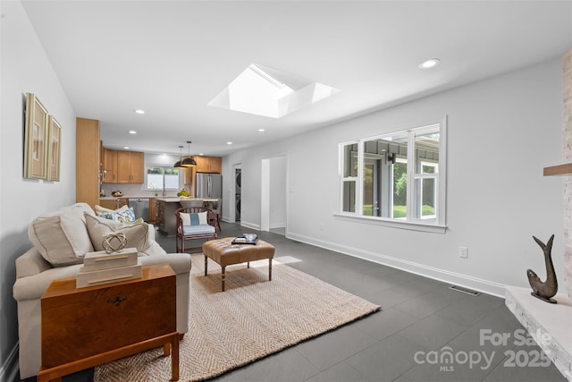 3701 Table Rock Rd, Charlotte, NC 28226 - living area featuring a skylight and recessed lighting
