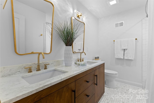 3701 Table Rock Rd, Charlotte, NC 28226 - bathroom featuring double vanity and toilet