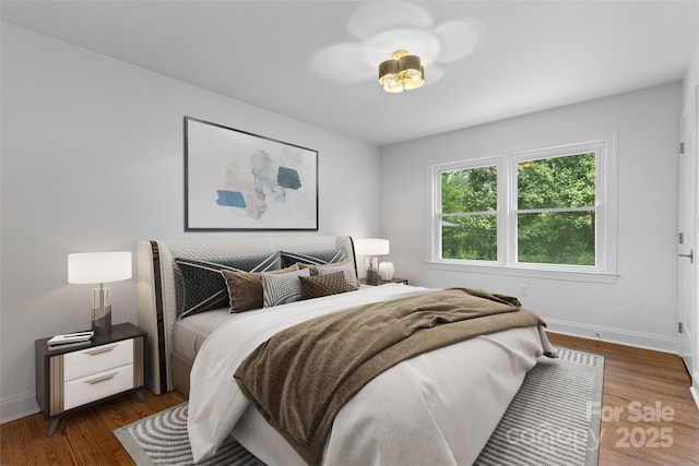 3701 Table Rock Rd, Charlotte, NC 28226 - bedroom with dark wood-style floors