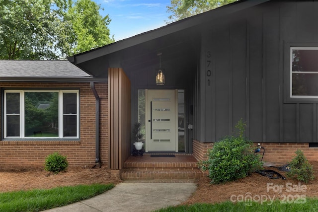 3701 Table Rock Rd, Charlotte, NC 28226 - doorway to property with board and batten siding and brick siding