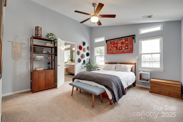 11615 Chadburn Ln, Charlotte, NC 28215 - carpeted bedroom with vaulted ceiling, ensuite bathroom, and ceiling fan