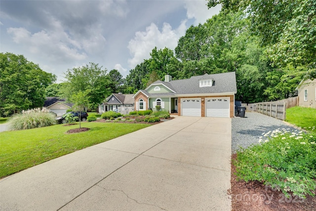 11615 Chadburn Ln, Charlotte, NC 28215 - view of front of house with driveway, an attached garage, brick siding, a chimney, and view of wooded area