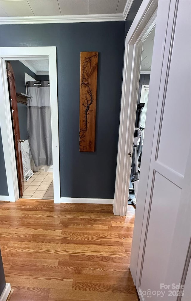 1314 Hathcock Ave, Albemarle, NC 28001 - hallway with light wood-type flooring and ornamental molding