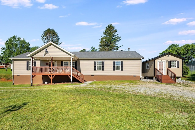 32 Bishop Ln, Flat Rock, NC 28731 - rear view of property featuring crawl space, entry steps, a lawn, and stairs