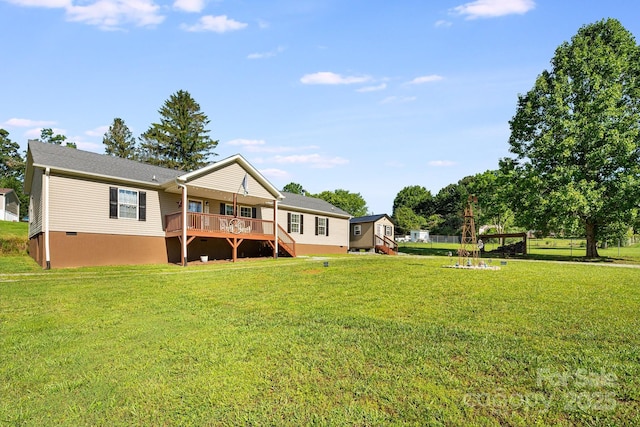 32 Bishop Ln, Flat Rock, NC 28731 - rear view of house with a yard, crawl space, and a deck