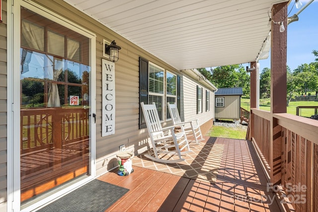 32 Bishop Ln, Flat Rock, NC 28731 - porch featuring a storage unit