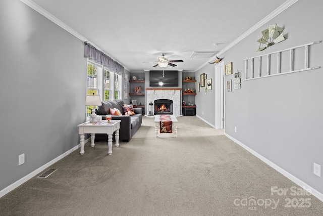32 Bishop Ln, Flat Rock, NC 28731 - carpeted living room featuring ceiling fan, crown molding, and a tile fireplace