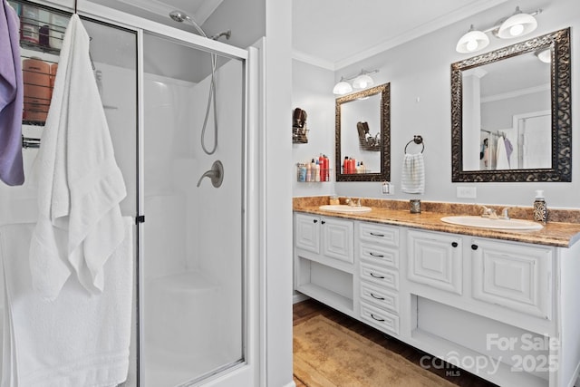 32 Bishop Ln, Flat Rock, NC 28731 - full bath with ornamental molding, a shower stall, wood finished floors, and double vanity