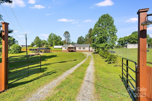 32 Bishop Ln, Flat Rock, NC 28731 - view of yard with driveway and a gate