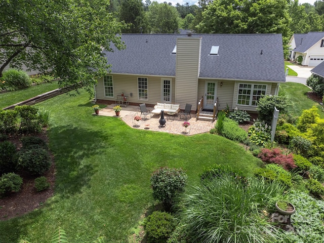 330 Stonehollow Rd, Fletcher, NC 28732 - rear view of house featuring a patio area, a yard, and a chimney