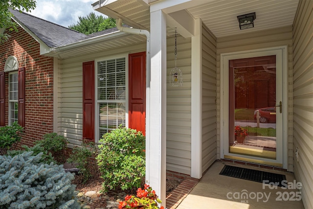 330 Stonehollow Rd, Fletcher, NC 28732 - property entrance with a shingled roof, brick siding, and covered porch