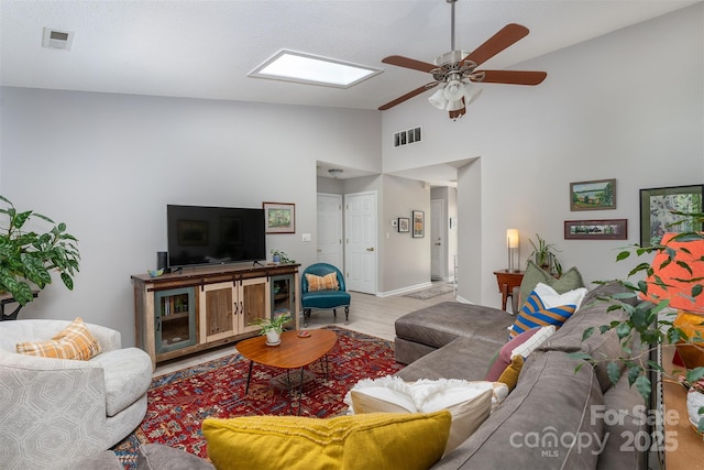 330 Stonehollow Rd, Fletcher, NC 28732 - living room featuring ceiling fan, high vaulted ceiling, and wood finished floors