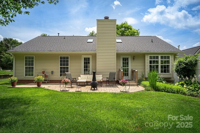 330 Stonehollow Rd, Fletcher, NC 28732 - back of house with an outdoor hangout area, a patio, a lawn, a chimney, and roof with shingles