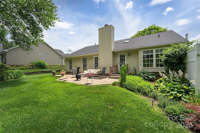 330 Stonehollow Rd, Fletcher, NC 28732 - rear view of house featuring a patio, a yard, a chimney, and a shingled roof