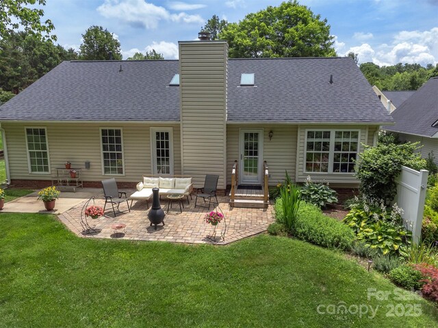330 Stonehollow Rd, Fletcher, NC 28732 - back of property with a lawn, a chimney, an outdoor hangout area, and a patio area