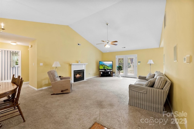 1958 Cameron Heights Cir, Denver, NC 28037 - carpeted living room featuring a fireplace with flush hearth, ceiling fan, high vaulted ceiling, and french doors