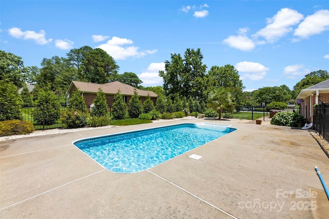 1958 Cameron Heights Cir, Denver, NC 28037 - view of swimming pool with a patio area and view of wooded area