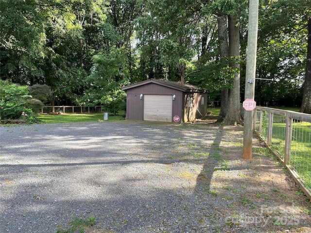 2411 Rebecca Ave, Charlotte, NC 28208 - detached garage featuring driveway