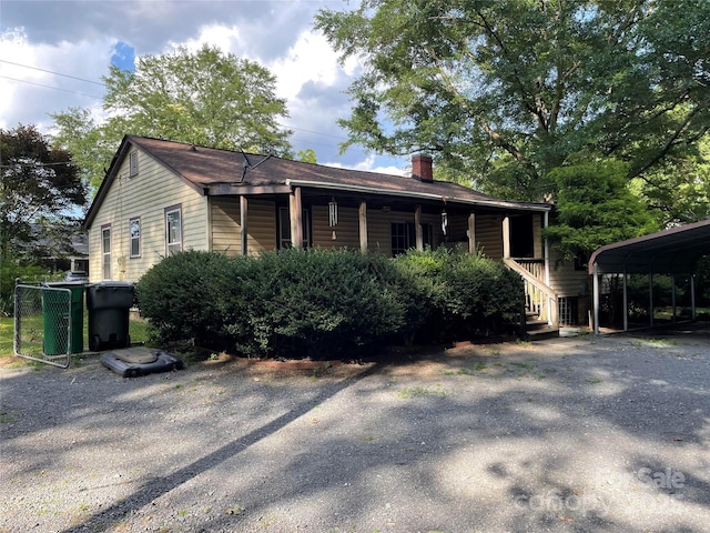 2411 Rebecca Ave, Charlotte, NC 28208 - view of front of property featuring a chimney