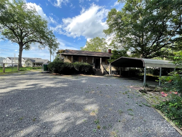 2411 Rebecca Ave, Charlotte, NC 28208 - view of front of house featuring a carport and driveway