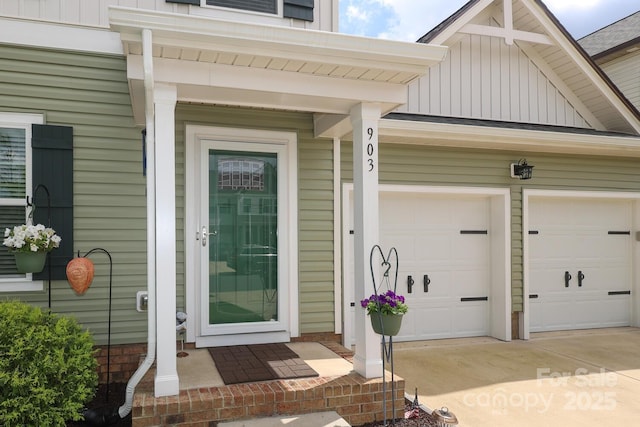 903 Von Buren Blvd, Rock Hill, SC 29730 - property entrance with a garage, concrete driveway, and board and batten siding