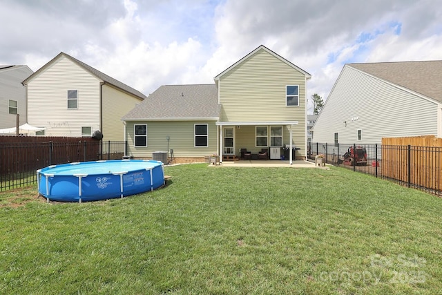 903 Von Buren Blvd, Rock Hill, SC 29730 - back of property featuring a shingled roof, a fenced backyard, and a patio