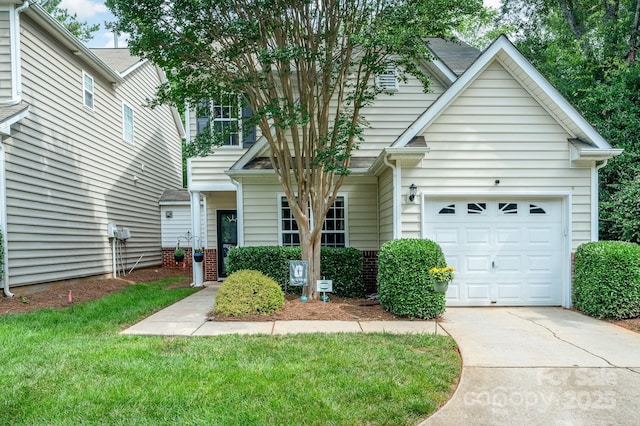 4703 David Cox Rd, Charlotte, NC 28269 - view of front facade with driveway, an attached garage, and a front yard